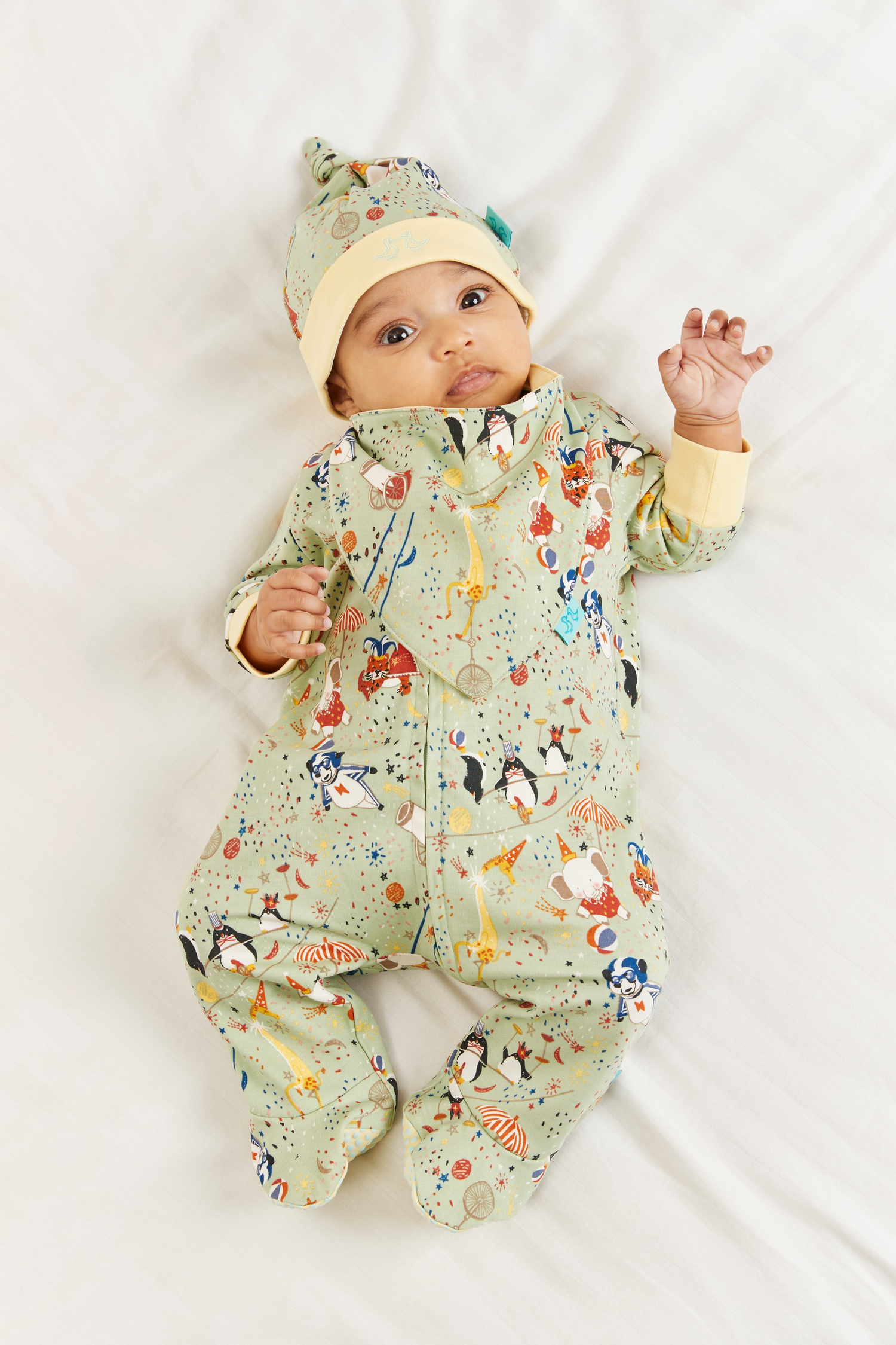 yellow baby grow with ducks on from Luca and Rosa